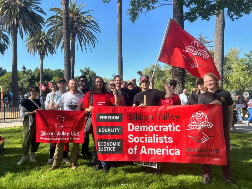 Illustrative, SVDSA comrades holding banners at May Day 2024.